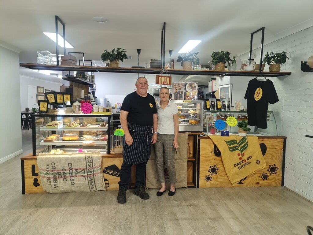 Marlene and Graham Manvell (Owners & Operators) standing Infront of their lovely cafe.